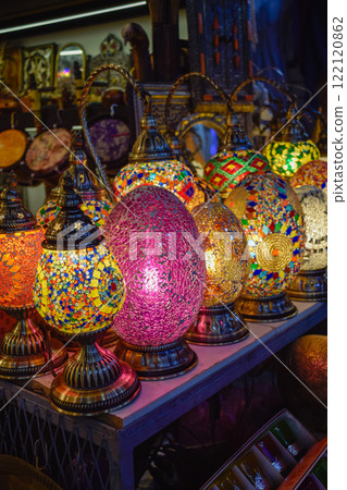 Shop of Arabic style lamps in different colors illuminated at Marrakech 122120862