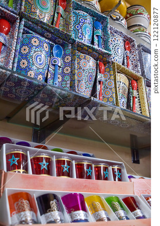 Colorful tea glasses displayed in a souvenir shop in Marrakech. Colorful tea glasses displayed in a souvenir shop in Marrakech. 122120877