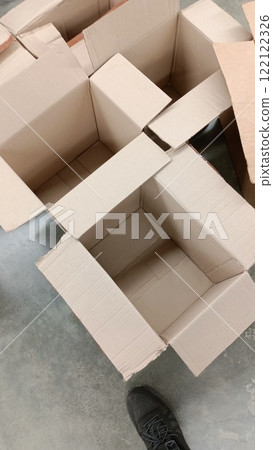 A collection of empty cardboard boxes is ready and waiting for packing and shipping purposes 122122326