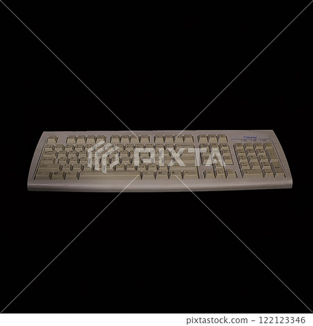 A Stunning Classic Computer Keyboard Displayed Beautifully Against a Black Background A Stunning Classic Computer Keyboard Displayed Beautifully Against a Black Background 122123346
