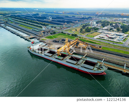 Aerial view of a coal vessel loading at a port in Australia 122124136