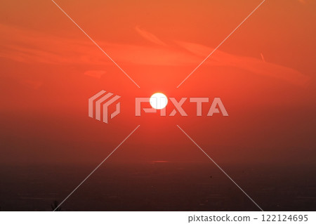 A beautiful sunset in the crimson sky above the horizon of the Ariake Sea A beautiful sunset in the crimson sky above the horizon of the Ariake Sea 122124695