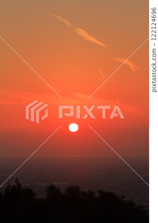 The setting sun paints the streets of Kurume in a beautiful orange hue The setting sun paints the streets of Kurume in a beautiful orange hue 122124696