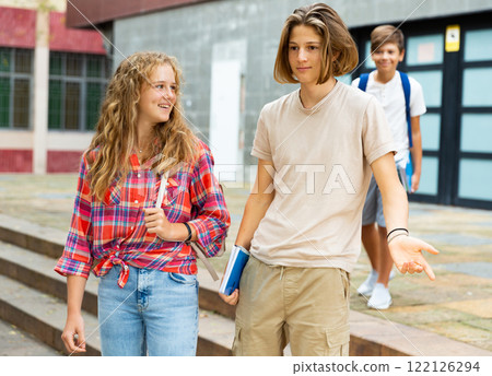 Teens going home after school 122126294