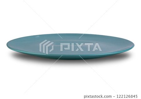 Side view of empty shallow blue ceramic plate isolated on white background. 122126845