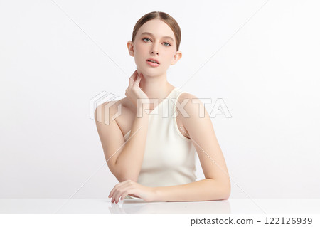 Beautiful young woman with clean fresh skin on white background, Face care, Facial treatment, Cosmetology, beauty and spa, women portrait. Beautiful young woman with clean fresh skin on white background, Face care, Facial treatment, Cosmetology, beauty and spa, women portrait. 122126939
