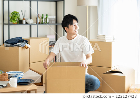 young man moving young man moving 122127428