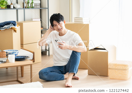 young man moving young man moving 122127442