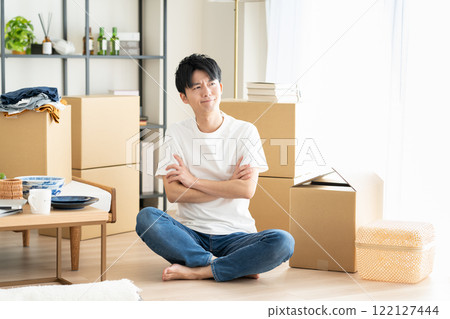 young man moving young man moving 122127444