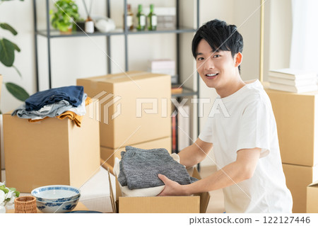 young man moving young man moving 122127446