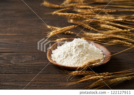 Wheat flour (strong flour) on a plate Wheat flour (strong flour) on a plate 122127911