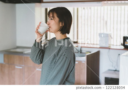 First thing in the morning: milk and a woman 122128034