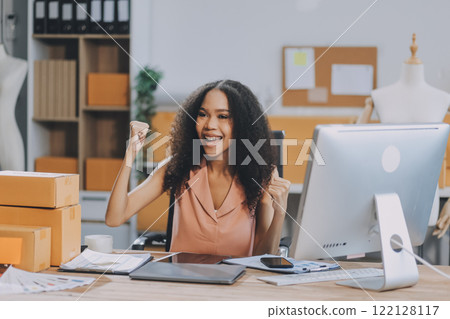 Portrait of Starting small businesses SME owners female entrepreneurs working on receipt box and check online orders to prepare to pack the boxes, sell to customers, SME business ideas online. 122128117