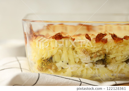 Concept of tasty and delicious homemade food - potato casserole Concept of tasty and delicious homemade food - potato casserole 122128361