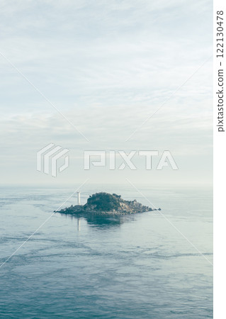 An island with a white lighthouse floating in the sea, Tokushima Prefecture An island with a white lighthouse floating in the sea, Tokushima Prefecture 122130478