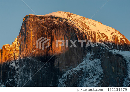 Half dome illuminated by the setting sun 122131279