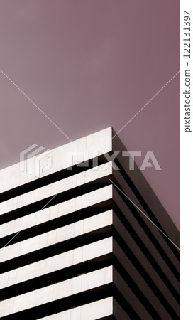 Minimalist Architectural Angle - Monochrome Facade Against Gradient Sky, Ideal for Modern Branding, Posters, or Real Estate Marketing 122131397
