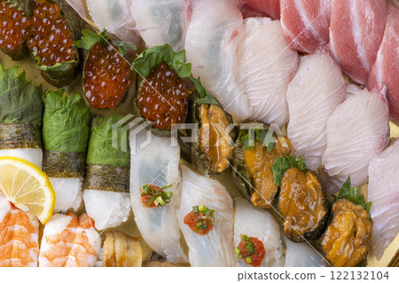A bird's-eye view of nigiri sushi with fresh ingredients 122132104