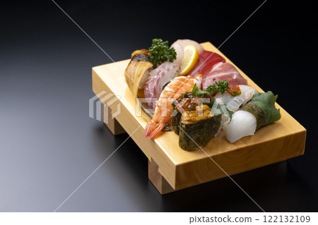Premium nigiri sushi set served on sushi geta with copy space 122132109