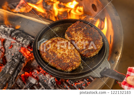 Charcoal grilled hamburger steak outdoors Charcoal grilled hamburger steak outdoors 122132183