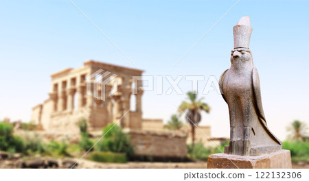 Horizontal banner with granite statue of falcon God Horus, palm and ancient columns, Karnak Temple Complex, Luxor (ancient Thebes), Egypt, North Africa Horizontal banner with granite statue of falcon God Horus, palm and ancient columns, Karnak Temple Complex, Luxor (ancient Thebes), Egypt, North Africa 122132306