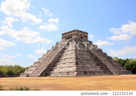 Ancient stone Mayan pyramid (Kukulcan Temple), Chichen Itza, Yucatan, Mexico. Summer vacation, travel, trip abroad on vacation, cruises and tours concept 122132310