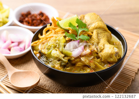 Northern Thai food (Khao Soi), Spicy curry noodles soup with chicken, Local Thai food Northern Thai food (Khao Soi), Spicy curry noodles soup with chicken, Local Thai food 122132687