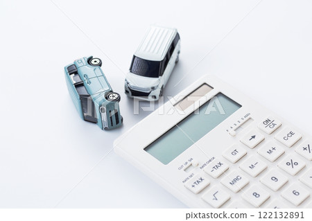 Car and white calculator causing a car accident 122132891