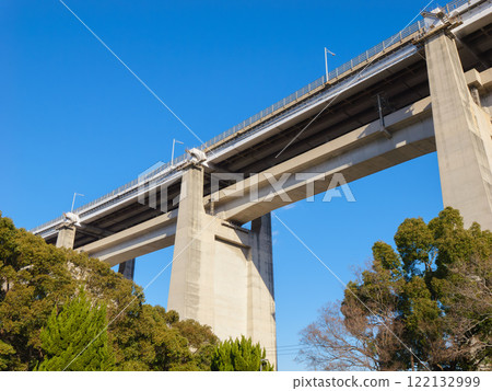 The Great Seto Bridge under a blue sky at the Great Seto Bridge Memorial Park in Kagawa Prefecture 122132999