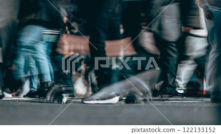 Pedestrians moving around Shibuya Scramble Crossing in Tokyo 122133152