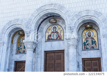 Belgrade, Serbia- 10162024: The Temple Of Saint Sava indoor interior, people pray in an Orthodox church, frescoes on the ceilings and walls of the church 122134875