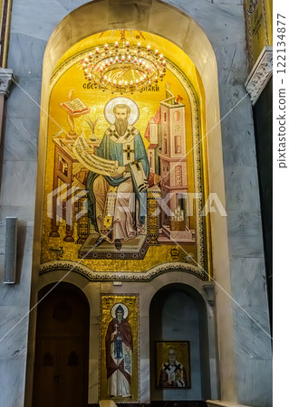 Belgrade, Serbia- 10162024: The Temple Of Saint Sava indoor interior, people pray in an Orthodox church, frescoes on the ceilings and walls of the church 122134877