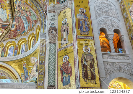 Belgrade, Serbia- 10162024: The Temple Of Saint Sava indoor interior, people pray in an Orthodox church, frescoes on the ceilings and walls of the church 122134887