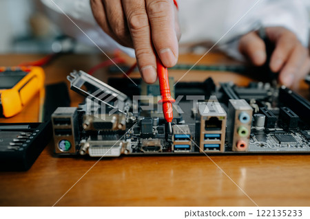 Repairing and upgrade mobile phone, electronic, computer hardware and technology concept. 122135233