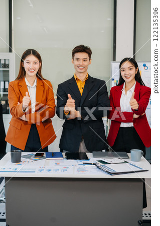 Business team creative businesspeople coworker in office Happy to be successful partnership teamwork success concept. 122135396