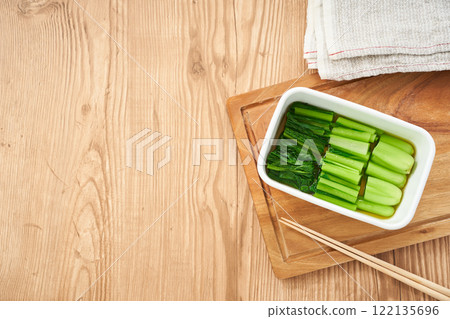 Simple and healthy boiled komatsuna – a classic Japanese side dish 122135696