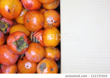 large amount of persimmons 122135920