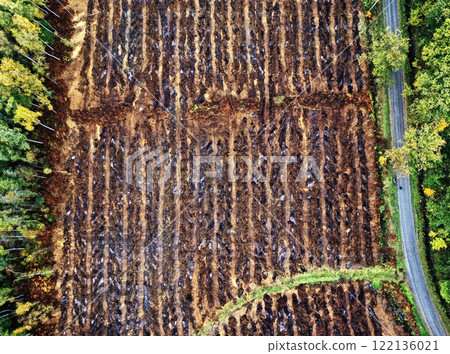 Peat extraction showing environmental destruction from above 122136021