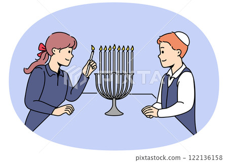 Jewish children stand near minora with burning candles, preparing for traditional holiday hanukkah Jewish children stand near minora with burning candles, preparing for traditional holiday hanukkah 122136158