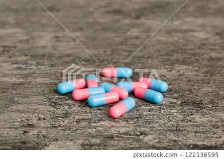 Collection Of Various Medical Tablets And Pills. Assorted pharmaceutical medicine pills, tablets and capsules on table background. Heap of assorted various medicine tablets. Health care 122136595