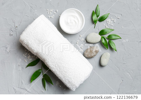 Coconut with jars of coconut oil and cosmetic cream on colored background. Top view. Free space for your text. Natural spa coconut cosmetics and organic treatment concept Coconut Spa composition Coconut with jars of coconut oil and cosmetic cream on colored background. Top view. Free space for your text. Natural spa coconut cosmetics and organic treatment concept Coconut Spa composition 122136679