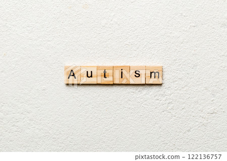autism word written on wood block. autism text on table, concept 122136757