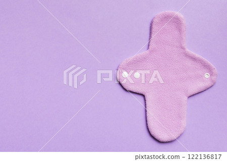 Eco-friendly reusable fabric women's pads. set of colorful bright reusable menstrual pads. zero waste woman periods concept top view with copy space 122136817