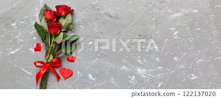Valentine day composition with rose flower and red heart on table. Top view, flat lay, copy space Holiday concept 122137020