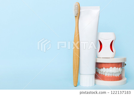 Mouthwash and other oral hygiene products on colored table top view with copy space. Flat lay. Dental hygiene. Oral care kit. Dentist concept 122137183