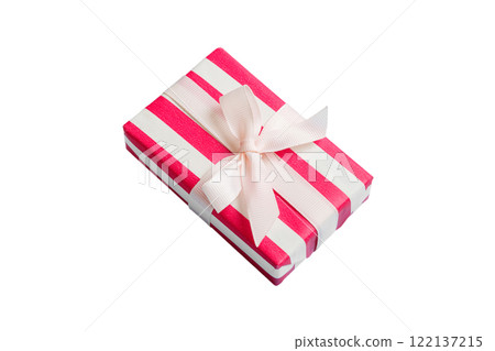 wrapped Christmas or other holiday handmade gift box in color paper with ribbon on colored background. Present box, decoration of gift on colored table, top view with copy space wrapped Christmas or other holiday handmade gift box in color paper with ribbon on colored background. Present box, decoration of gift on colored table, top view with copy space 122137215