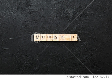 Members word written on wood block. Members text on cement table for your desing, concept Members word written on wood block. Members text on cement table for your desing, concept 122137217