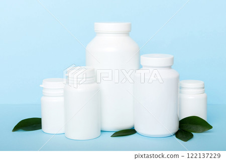 supplement pills with medicine bottle health care and medical top view. Vitamin tablets. Top view mockup bottle for pills and vitamins with green leaves, natural organic bio supplement, copy space supplement pills with medicine bottle health care and medical top view. Vitamin tablets. Top view mockup bottle for pills and vitamins with green leaves, natural organic bio supplement, copy space 122137229