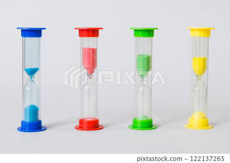 hourglass on the table, sand clock as time passing concept for business deadline, copy space 122137265