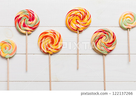 Set of colorful lollipops on colored background. Summer concept. Party Happy Birthday or Minimalist Concept 122137266